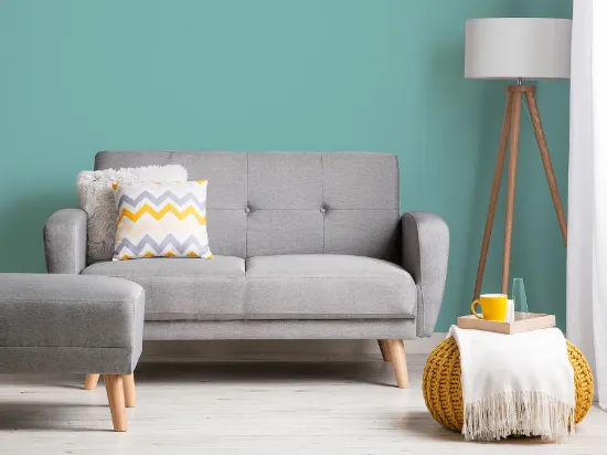 Éliane Convertible Sofa from natural wood legs  & Tufted Backrest.